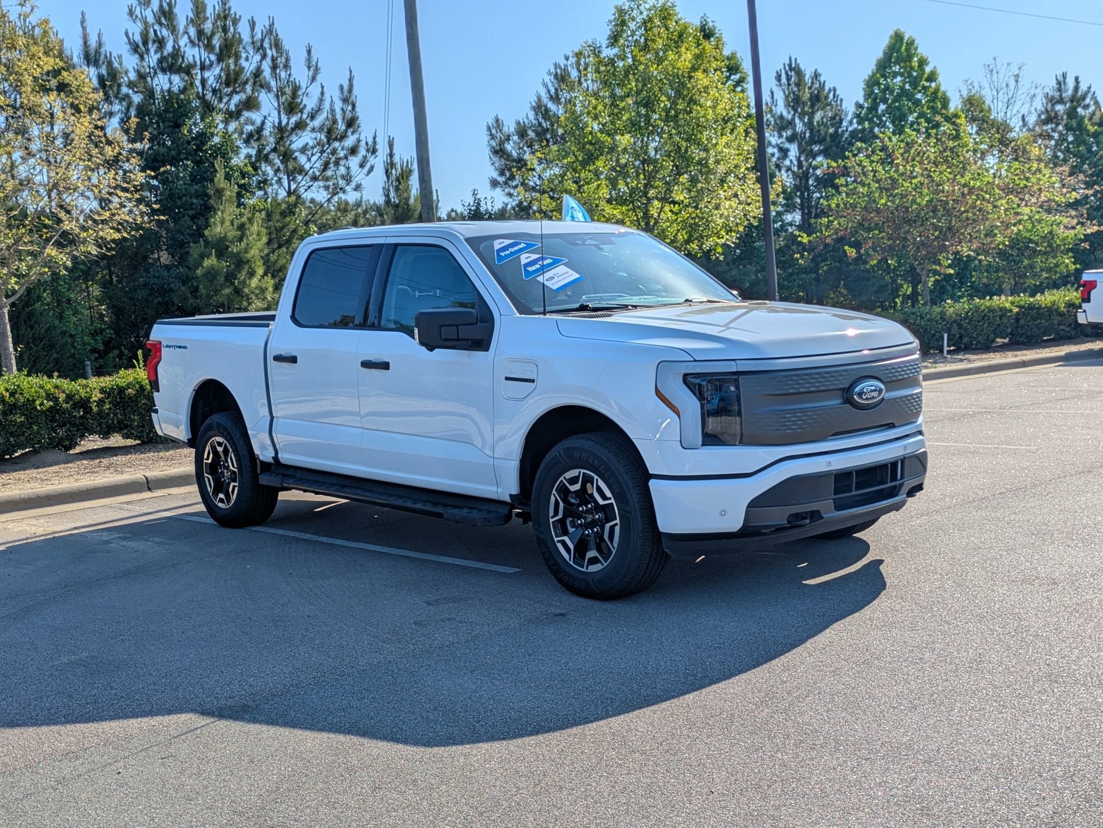 Used 2023 Ford F-150 Lightning XLT with VIN 1FTVW1EL1PWG11272 for sale in Apex, NC