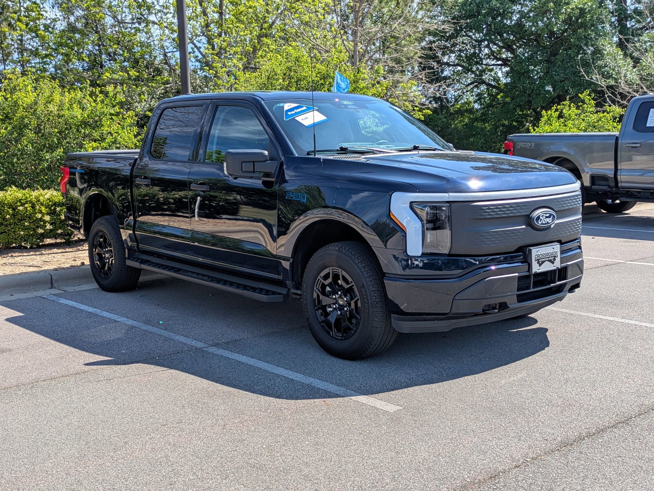 Used 2025 Ford F-150 Lightning XLT with VIN 1FTVW3LK1SWG00559 for sale in Apex, NC