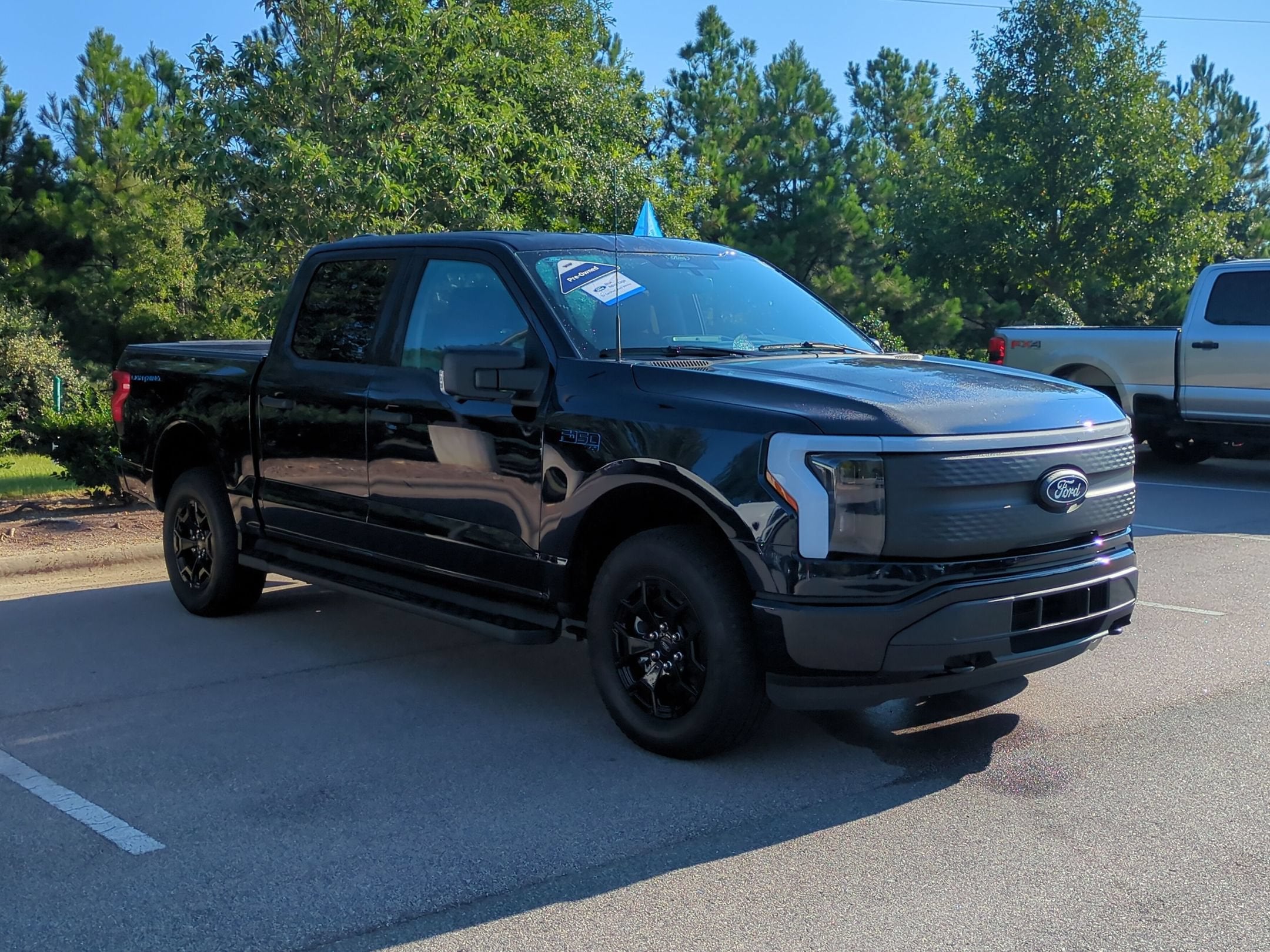 Used 2025 Ford F-150 Lightning XLT with VIN 1FTVW3LK5SWG00838 for sale in Apex, NC