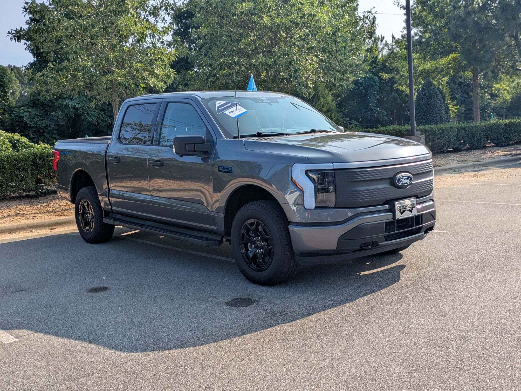 Used 2025 Ford F-150 Lightning XLT with VIN 1FTVW3LK9SWG24110 for sale in Apex, NC