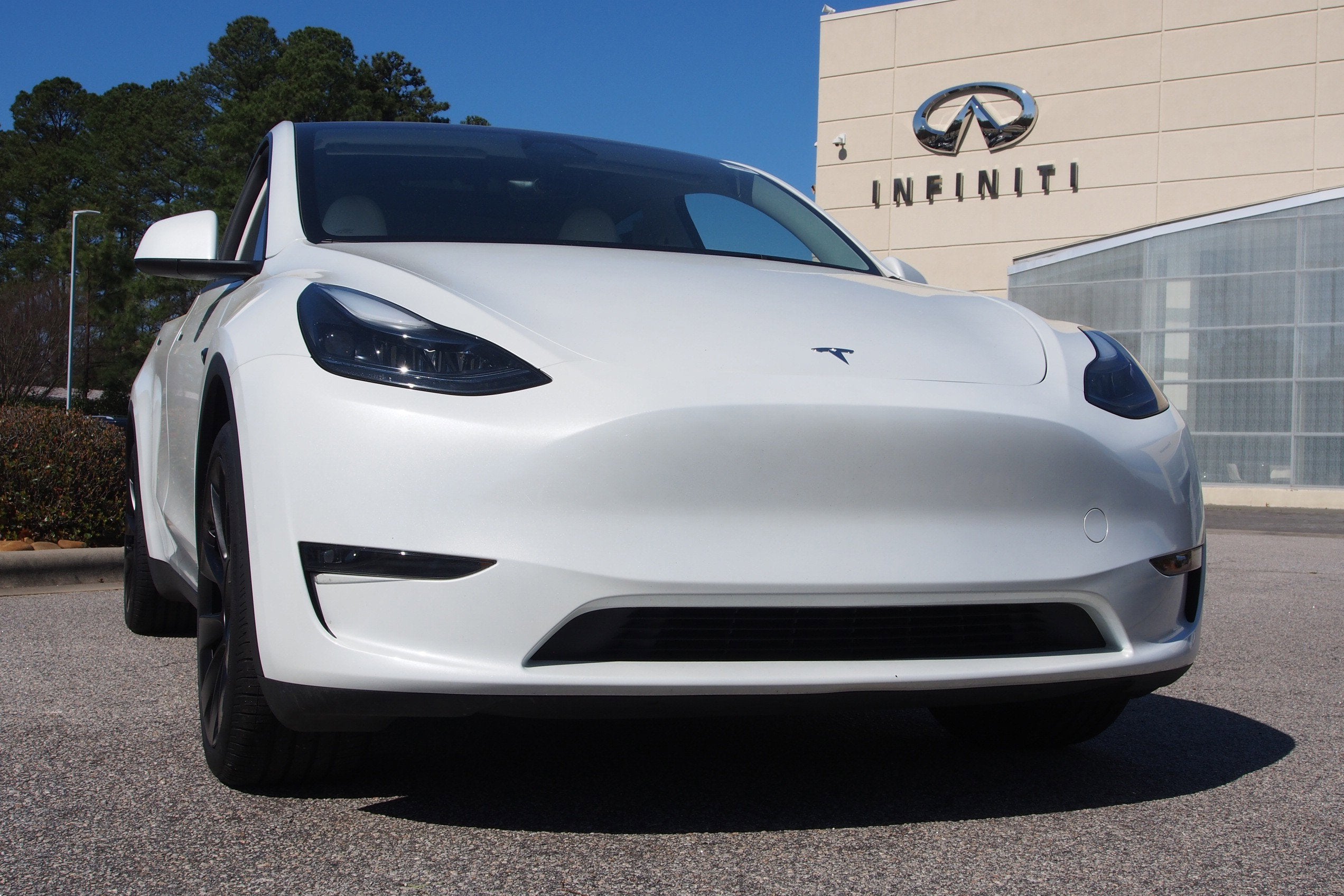 Used 2024 Tesla Model Y Long Range with VIN 7SAYGAEE9RF125282 for sale in Apex, NC